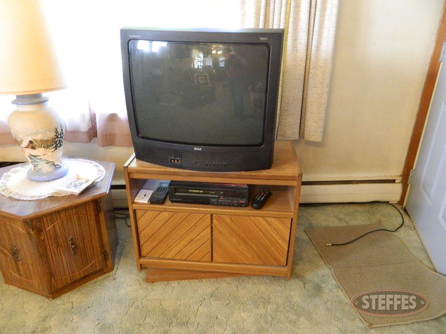 RCA  27" Television, Stand and Contents, and VCR